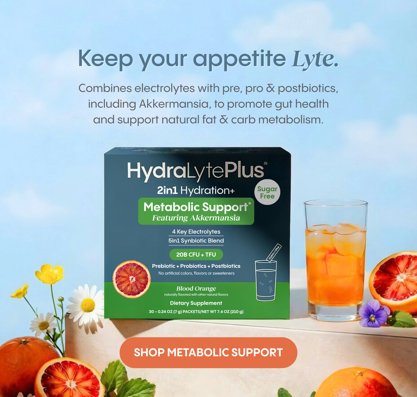 HydraLytePlus metabolic support supplement box with a glass of iced tea and blood oranges on a bright background.